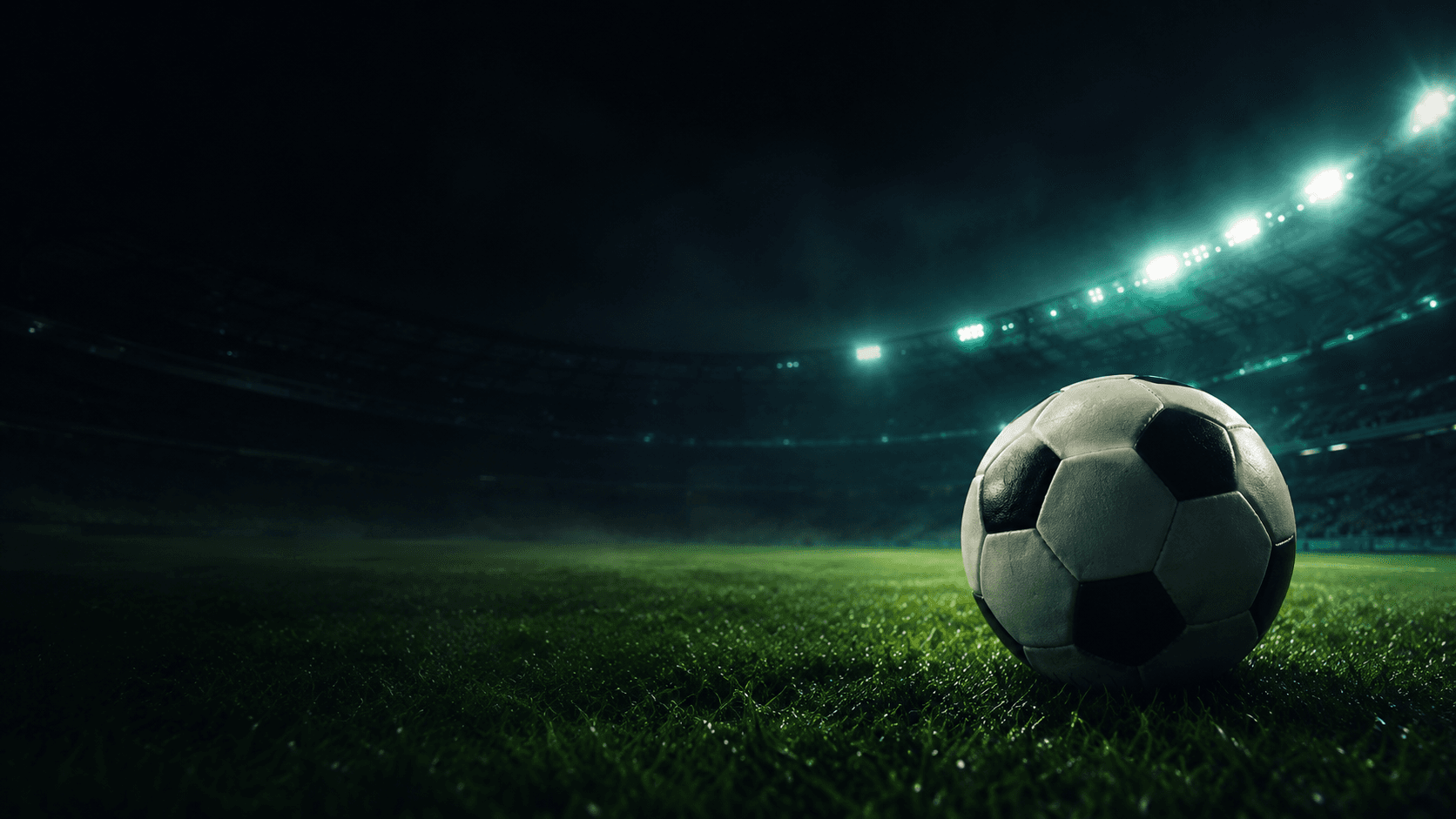 Football on a stadium pitch